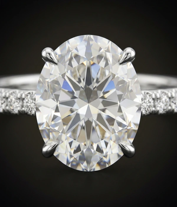 Ovaali timanttisormus 3,05 ct, pavee-kisko, 18k valkokulta, yksityiskohta lähikuvana